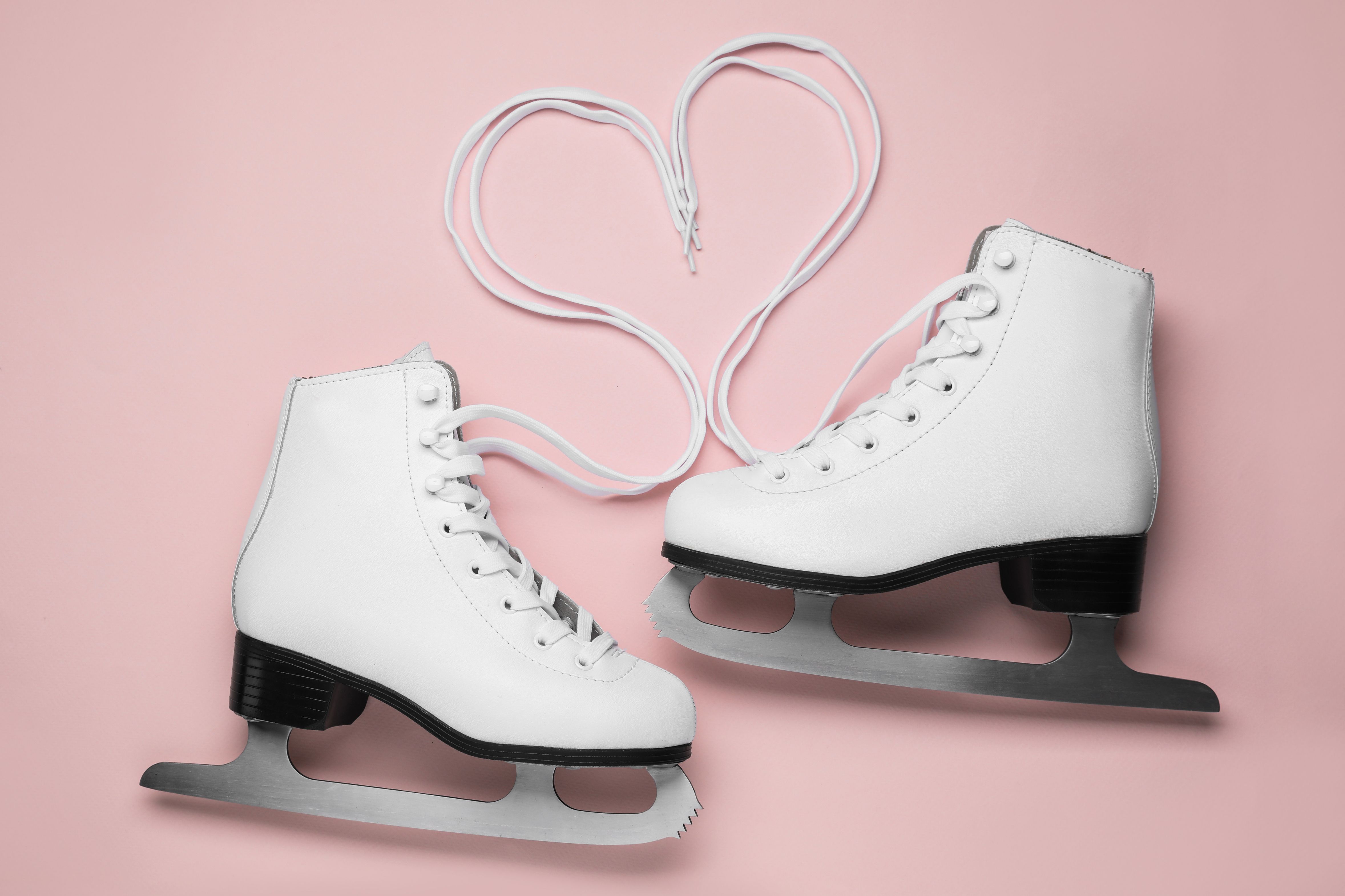 figure skates with laces making heart